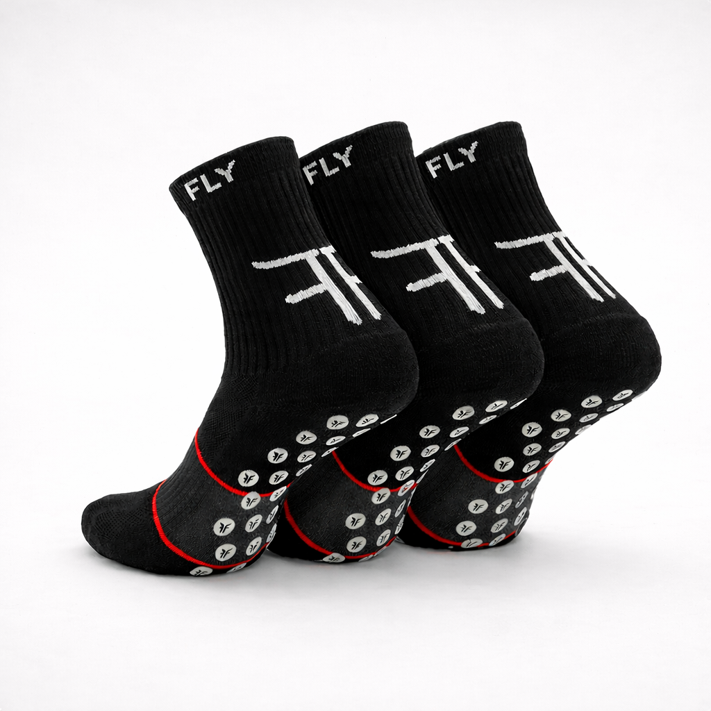 Three black socks with 'FLY' branding on a white background